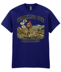 Front view of the Uphill Society Walking Off My Life Choices T-Shirt, featuring backpacked hiker in rolling countryside with Walking Off My Life Choices lettering.
