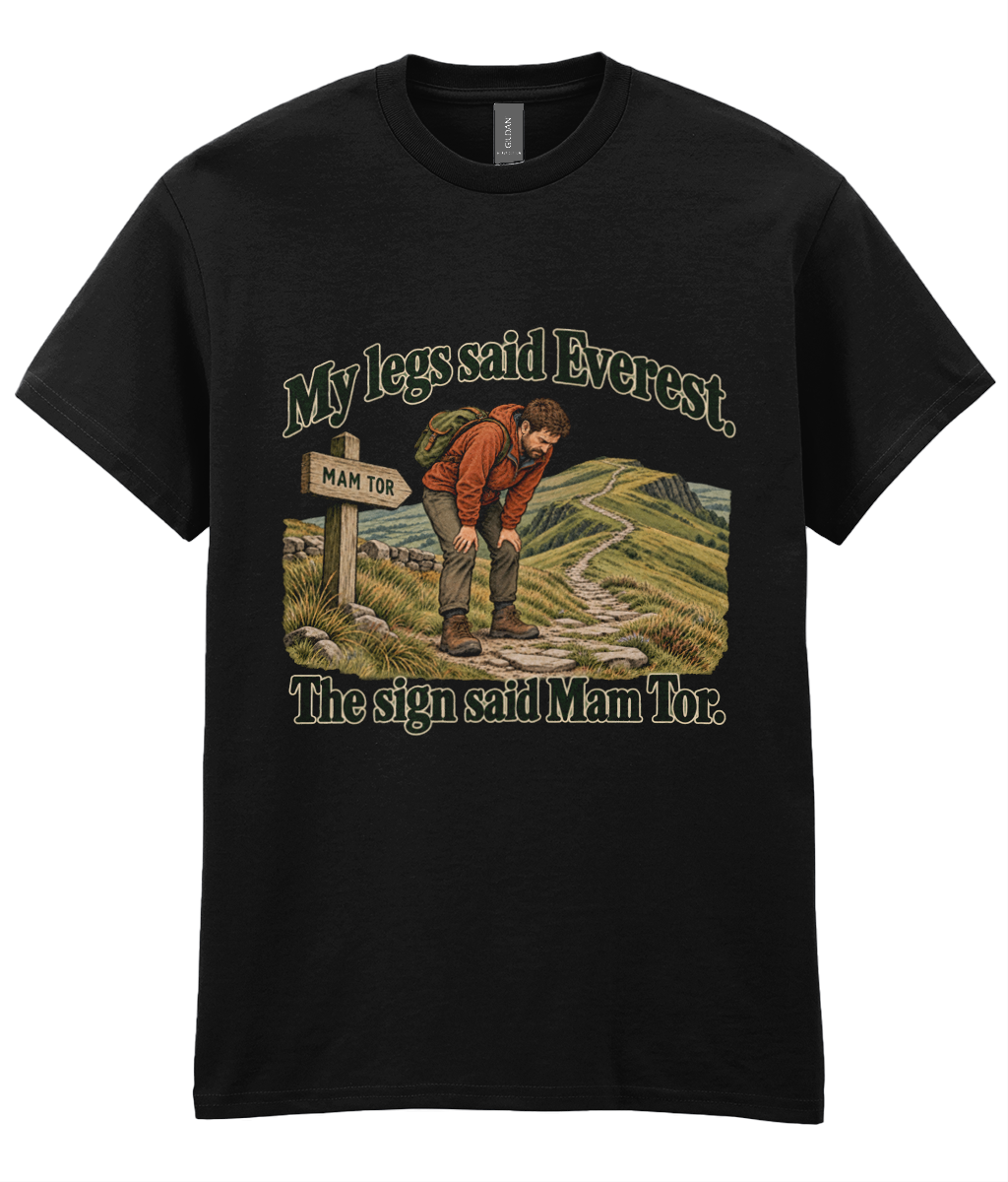 Front view of the Uphill Society My Legs Said Everest T-Shirt, featuring tired hiker beside a Mam Tor sign with My legs said Everest lettering.